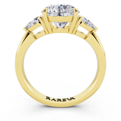 18 KT Yellow Gold Round Cut Diamond Three Stone Pear Accent Ring - through finger