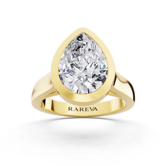 18 KT Yellow Gold Pear Cut Diamond Bezel Set Solitaire Ring - top angle