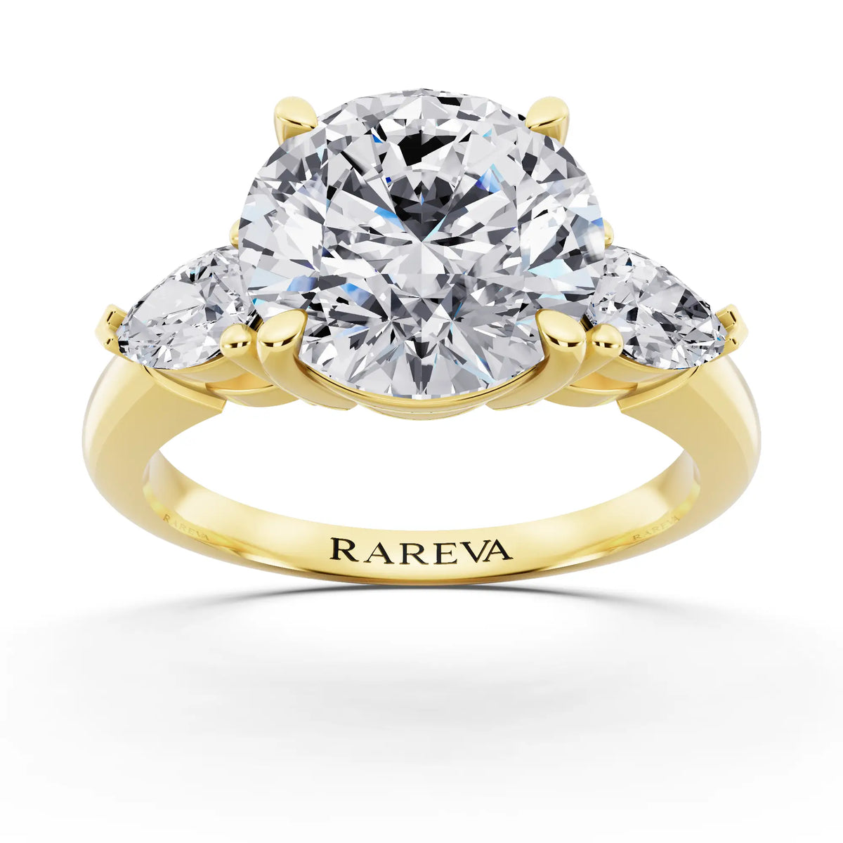 18 KT Yellow Gold Round Cut Diamond Three Stone Pear Accent Ring - front view