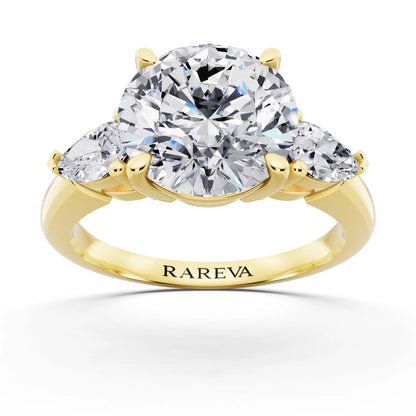 18 KT Yellow Gold Round Cut Diamond Three Stone Pear Accent Ring - front view