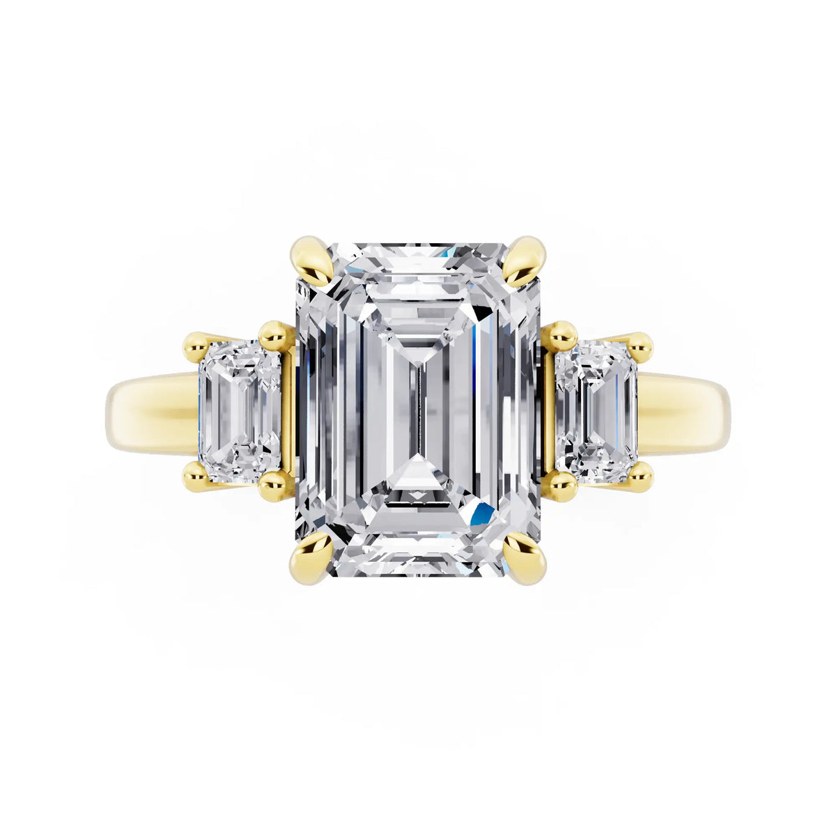 14 KT Yellow Gold Emerald Cut Diamond Three Stone Emerald Accent Ring - top angle