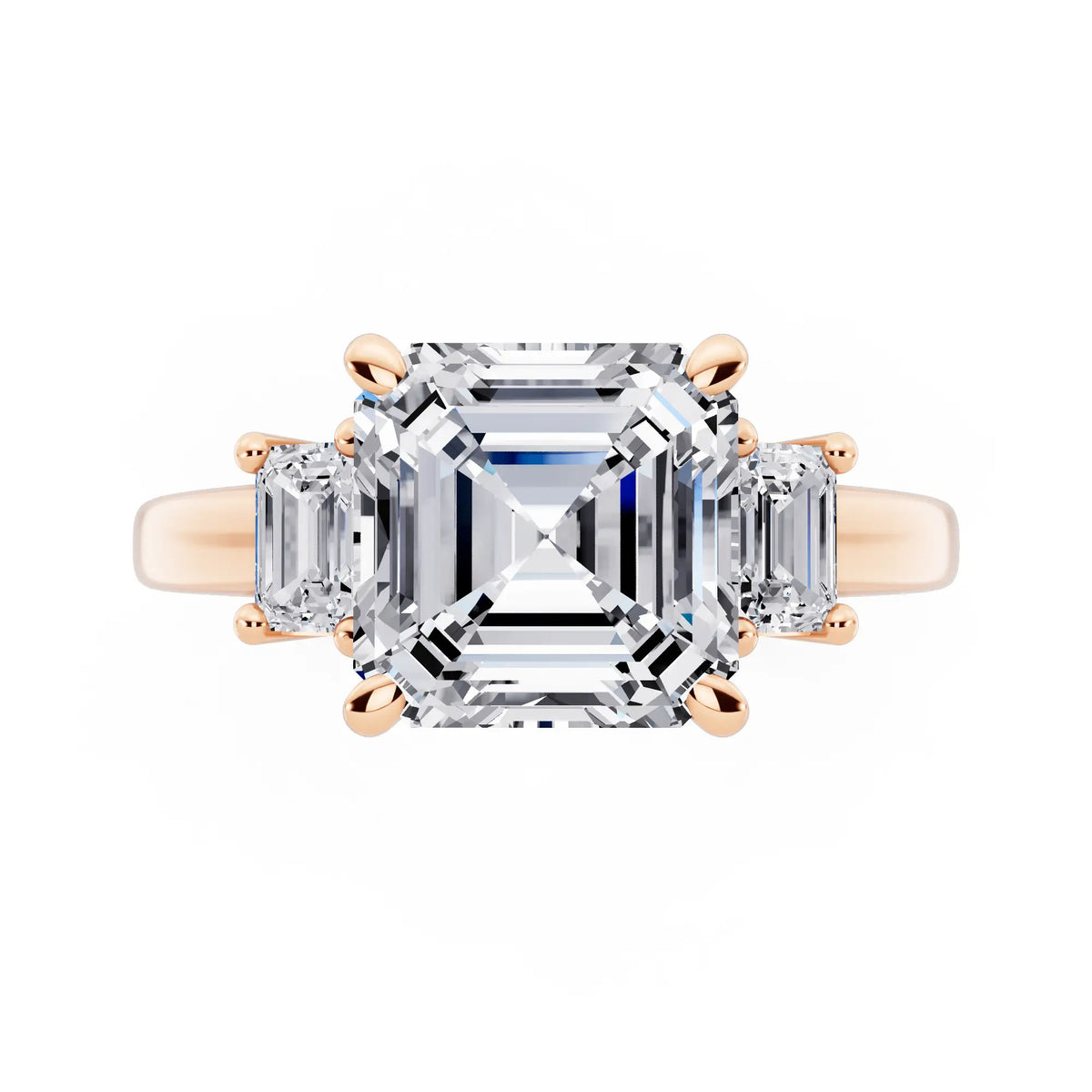 18 KT Rose Gold Asscher Cut Diamond Three Stone Emerald Accent Ring - top angle