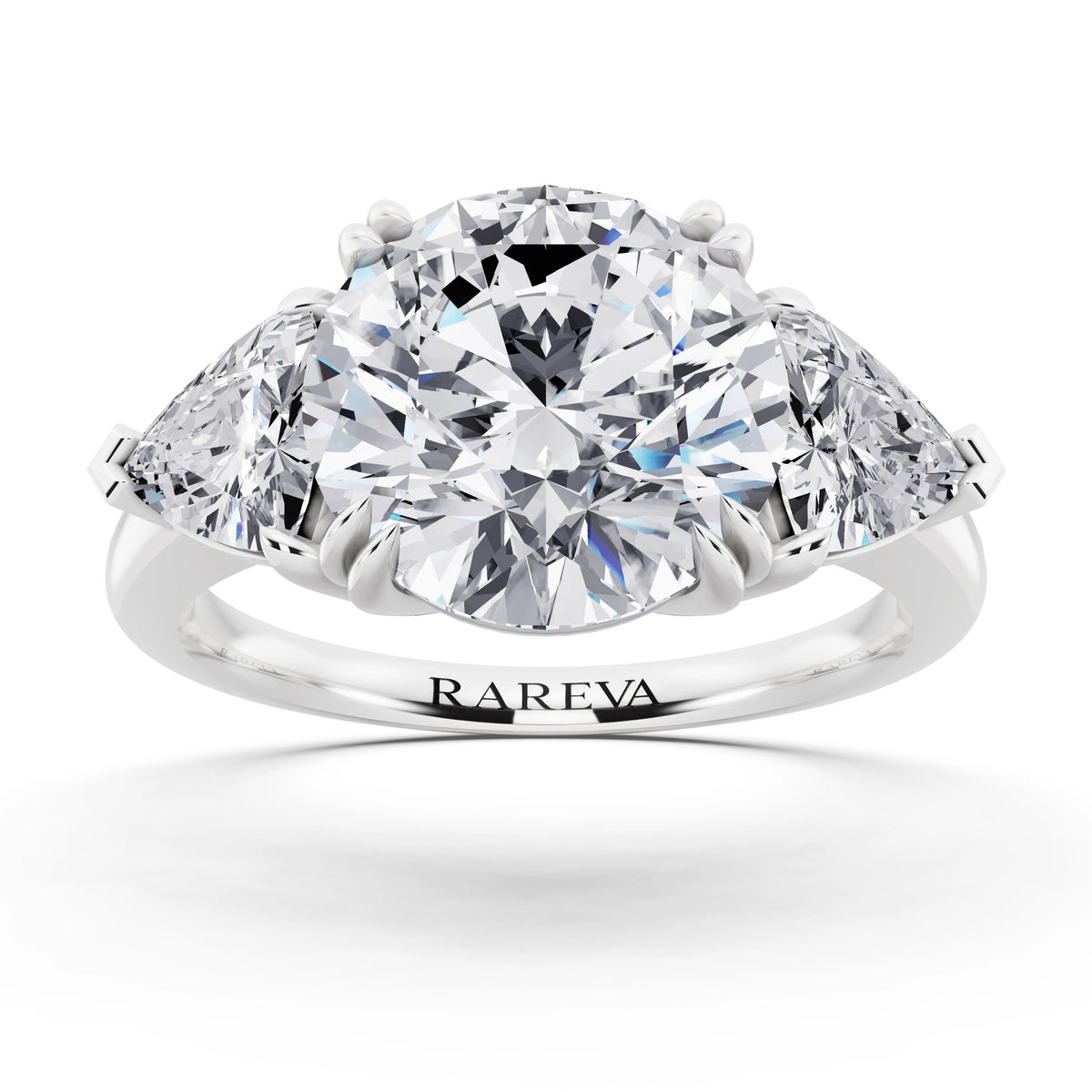 18 KT White Gold Round Cut Diamond Three Stone Ring with Trillion Accents - front view