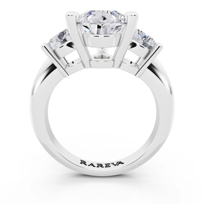 18 KT White Gold Pear Cut Diamond Three Stone Ring with Round Accents - through finger