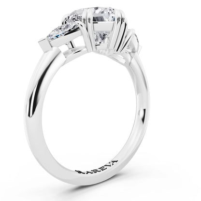 18 KT White Gold Heart Cut Diamond Three Stone Ring with Trillion Accents - top view