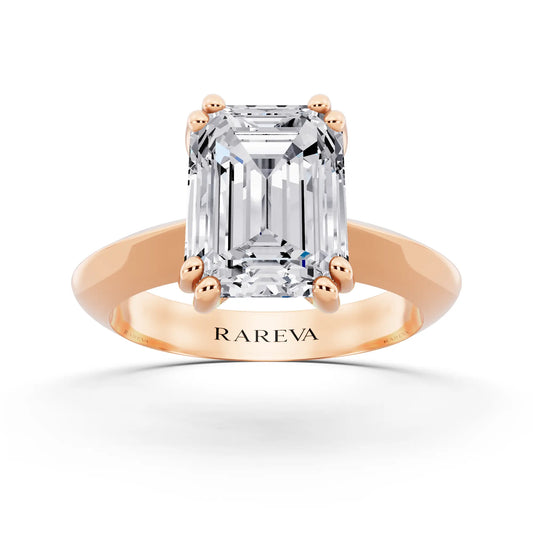 18 KT Rose Gold Emerald Cut Diamond Solitaire Ring with Knife Edge Band - front view