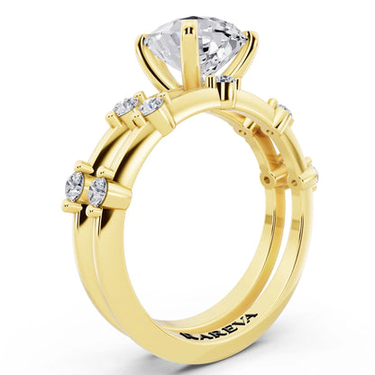 14 KT Yellow Gold Pear Cut Diamond Ring with Floating Accent Band - top view