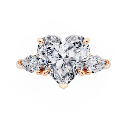 14 KT Rose Gold Heart Cut Diamond Three Stone Pear Accent Ring - top angle