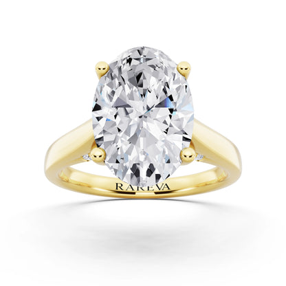 18 KT Yellow Gold Oval Cut Diamond Solitaire Ring with Hidden Accent - front view