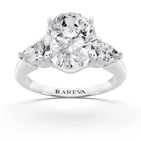 18 KT White Gold Oval Cut Diamond Three Stone Pear Accent Ring - front view