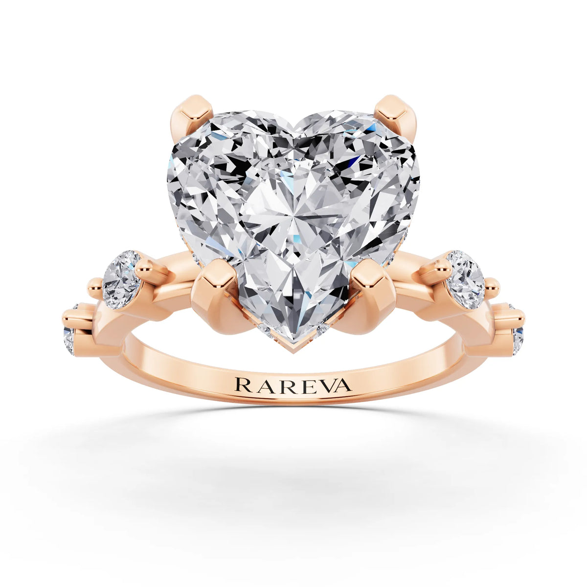 14 KT Rose Gold Heart Cut Diamond Solitaire Ring with Floating Diamond Accents - front view