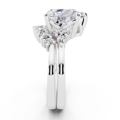 18 KT White Gold Pear Cut Diamond Ring with Curved Cluster Band - side view