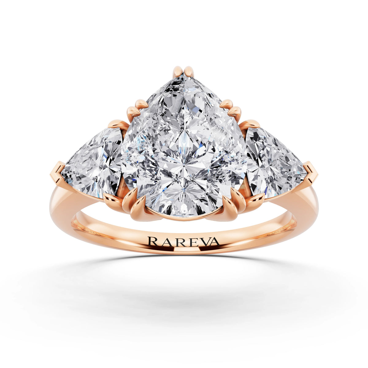 18 KT Rose Gold Pear Cut Diamond Three Stone Ring with Trillion Accents - front view