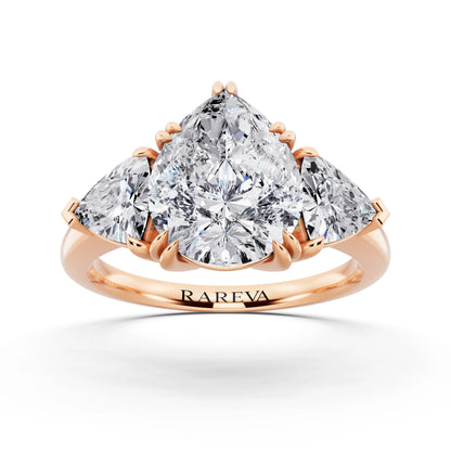 18 KT Rose Gold Pear Cut Diamond Three Stone Ring with Trillion Accents - front view