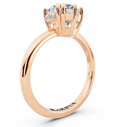 14 KT Rose Gold Round Cut Diamond Solitaire Ring with Hidden Accent Basket - top view