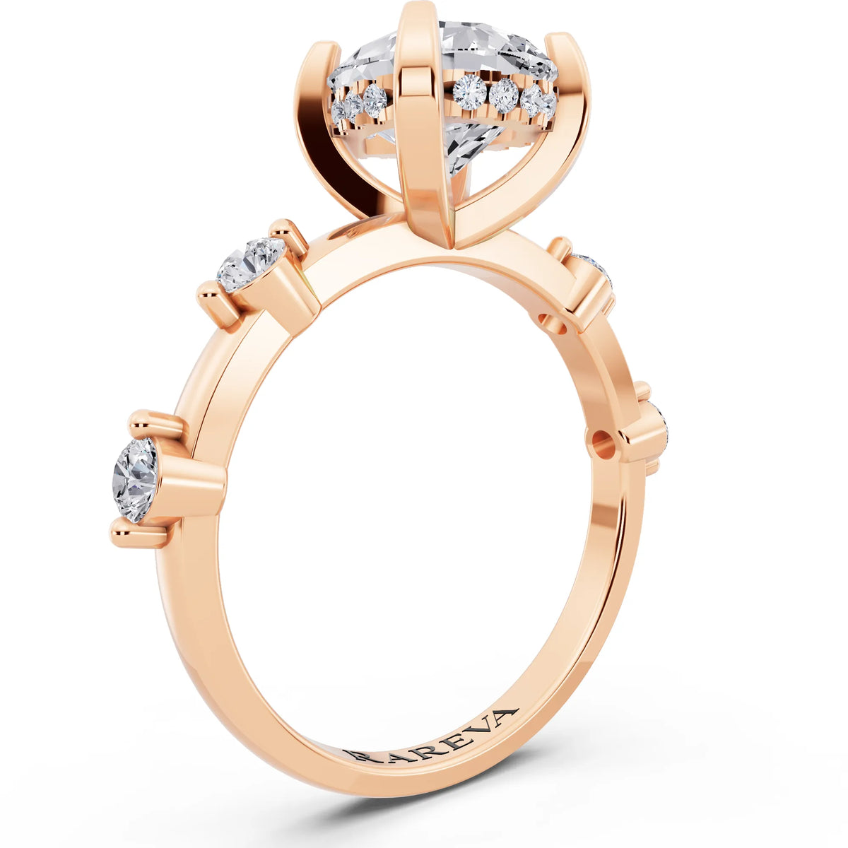 14 KT Rose Gold Pear Cut Diamond Solitaire Ring with Floating Diamond Accents - top view