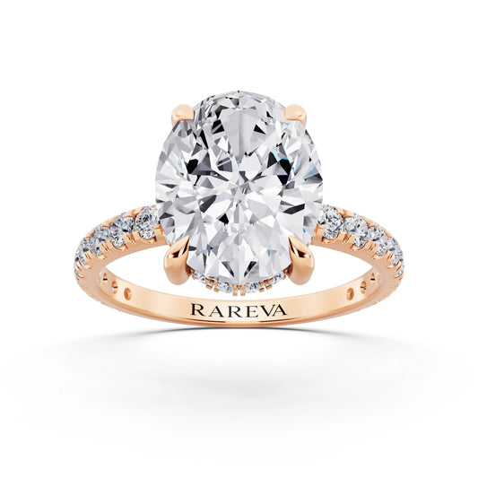 14 KT Rose Gold Oval Cut Diamond Solitaire Ring with Hidden Halo and French Pave Band - front view