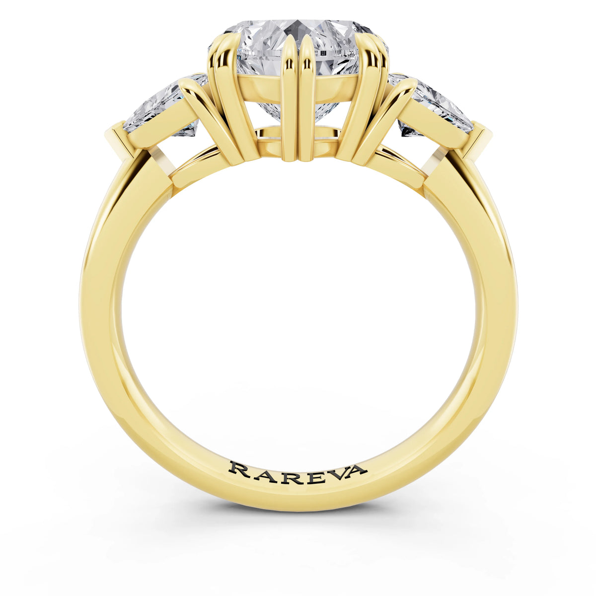 14 KT Yellow Gold Heart Cut Diamond Three Stone Ring with Trillion Accents - through finger