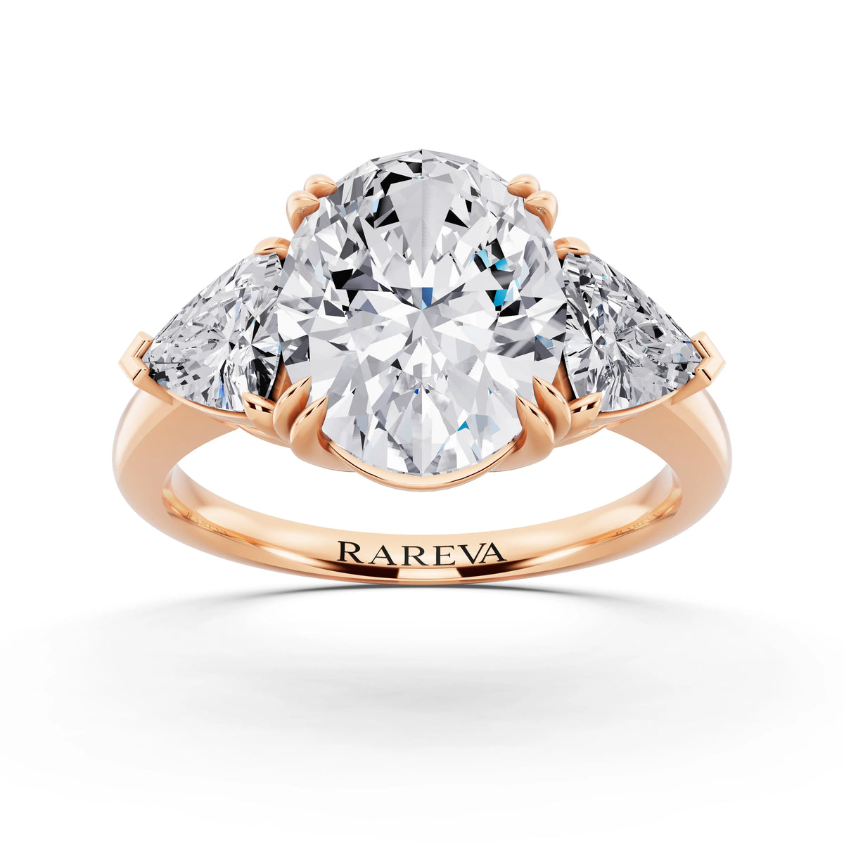 14 KT Rose Gold Oval Cut Diamond Three Stone Ring with Trillion Accents - front view