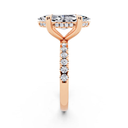 18 KT Rose Gold Marquise Cut Diamond Solitaire Ring with Round Pavé Band and Prong Setting - side view