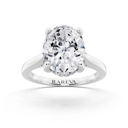 18 KT White Gold Oval Cut Diamond Solitaire Ring with Cathedral Band - front view