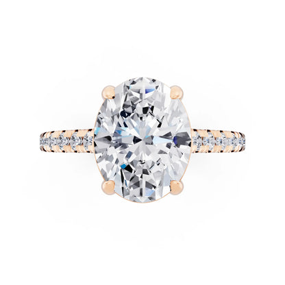 18 KT Rose Gold Oval Cut Diamond Claw Prong Solitaire Ring with French Pave Band - top angle
