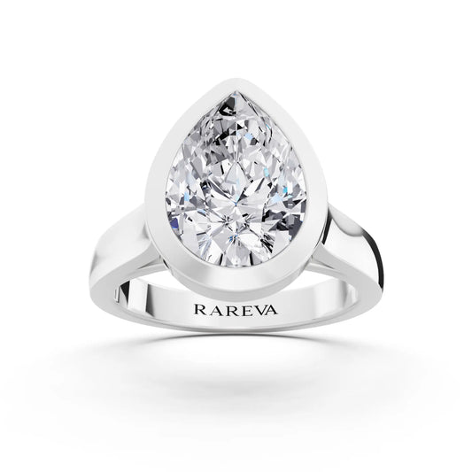 18 KT White Gold Pear Cut Diamond Bezel Set Solitaire Ring - top angle