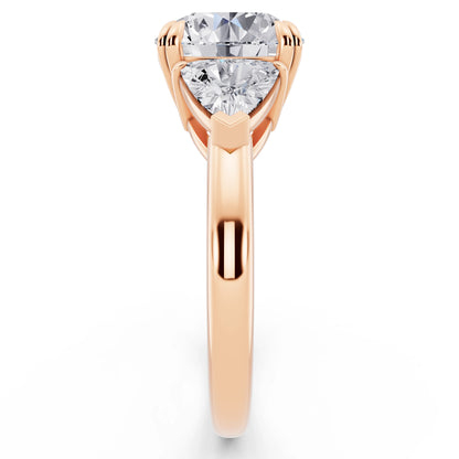 18 KT Rose Gold Round Cut Diamond Three Stone Ring with Trillion Accents - side view