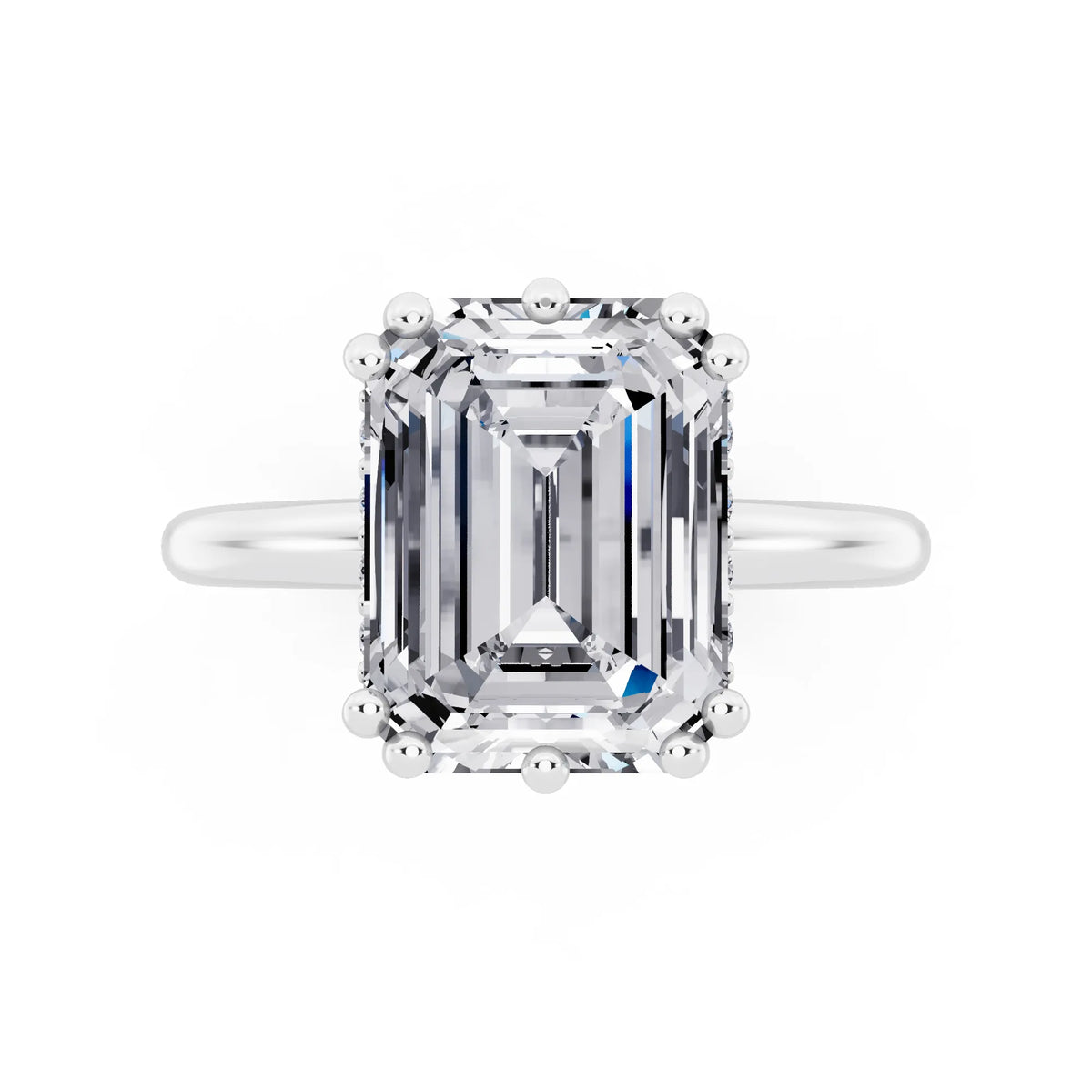 18 KT White Gold Emerald Cut Diamond Solitaire Ring with Hidden Accent Basket - top angle