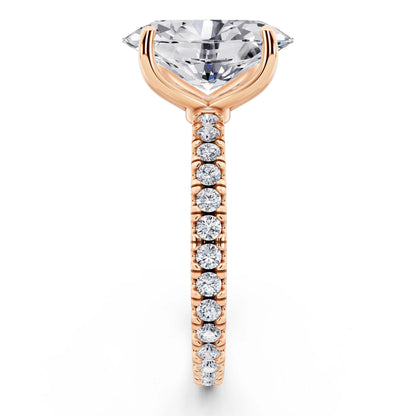 18 KT Rose Gold Oval Cut Diamond Solitaire Ring with Pave Eternity Band - side view
