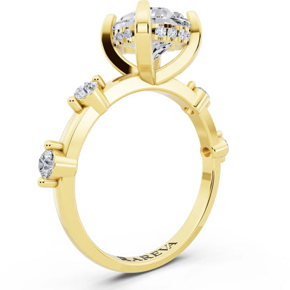 18 KT Yellow Gold Pear Cut Diamond Solitaire Ring with Floating Diamond Accents - top view