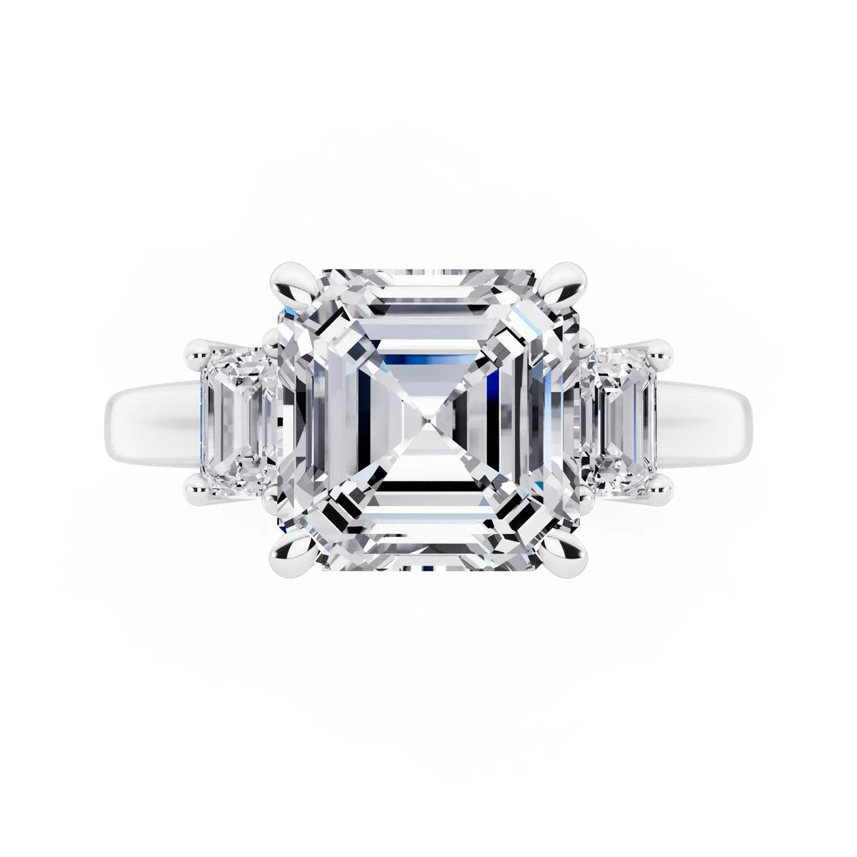 18 KT White Gold Asscher Cut Diamond Three Stone Emerald Accent Ring - top angle