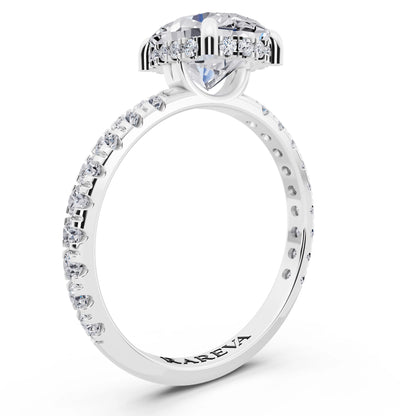 18 KT White Gold Oval Cut Diamond Solitaire Ring with Hidden Halo and French Pave Band - top view