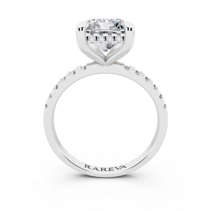 18 KT White Gold Radiant Cut Diamond Solitaire Ring with Round Pavé Band and Prong Setting - through finger