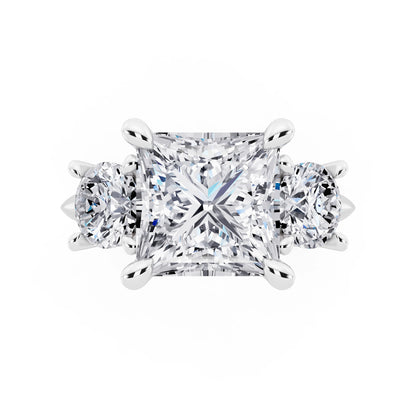 14 KT White Gold Princess Cut Diamond Three Stone Ring with Round Accents - top angle