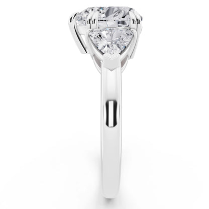 Platinum Heart Cut Diamond Three Stone Ring with Trillion Accents - side view