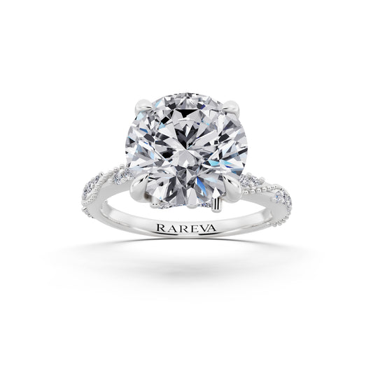 18 KT White Gold Round Cut Diamond Ring with Marquise Accent - front view