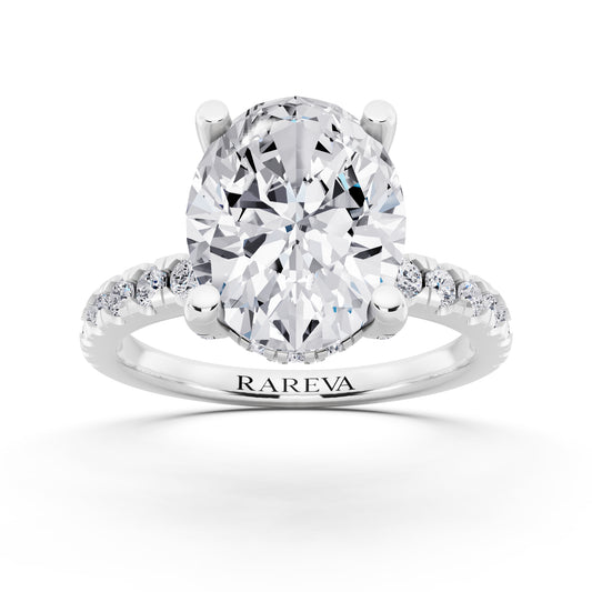 Platinum Oval Cut Diamond Hidden Halo Ring with Pave Shank - front view
