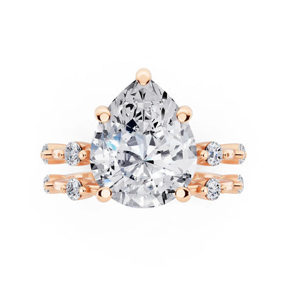 14 KT Rose Gold Pear Cut Diamond Ring with Floating Accent Band - top angle