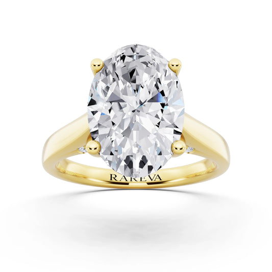 14 KT Yellow Gold Oval Cut Diamond Solitaire Ring with Hidden Accent - front view