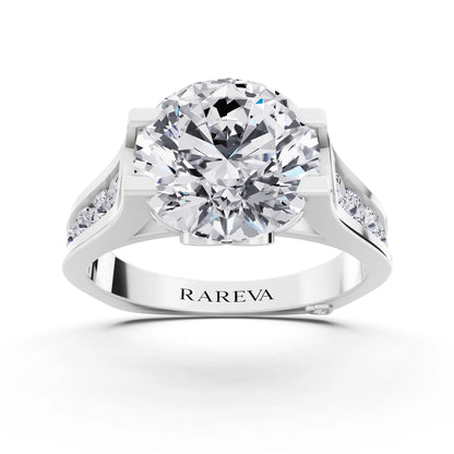 Platinum Round Cut Diamond Solitaire Ring with Graduated Channel Band - Front