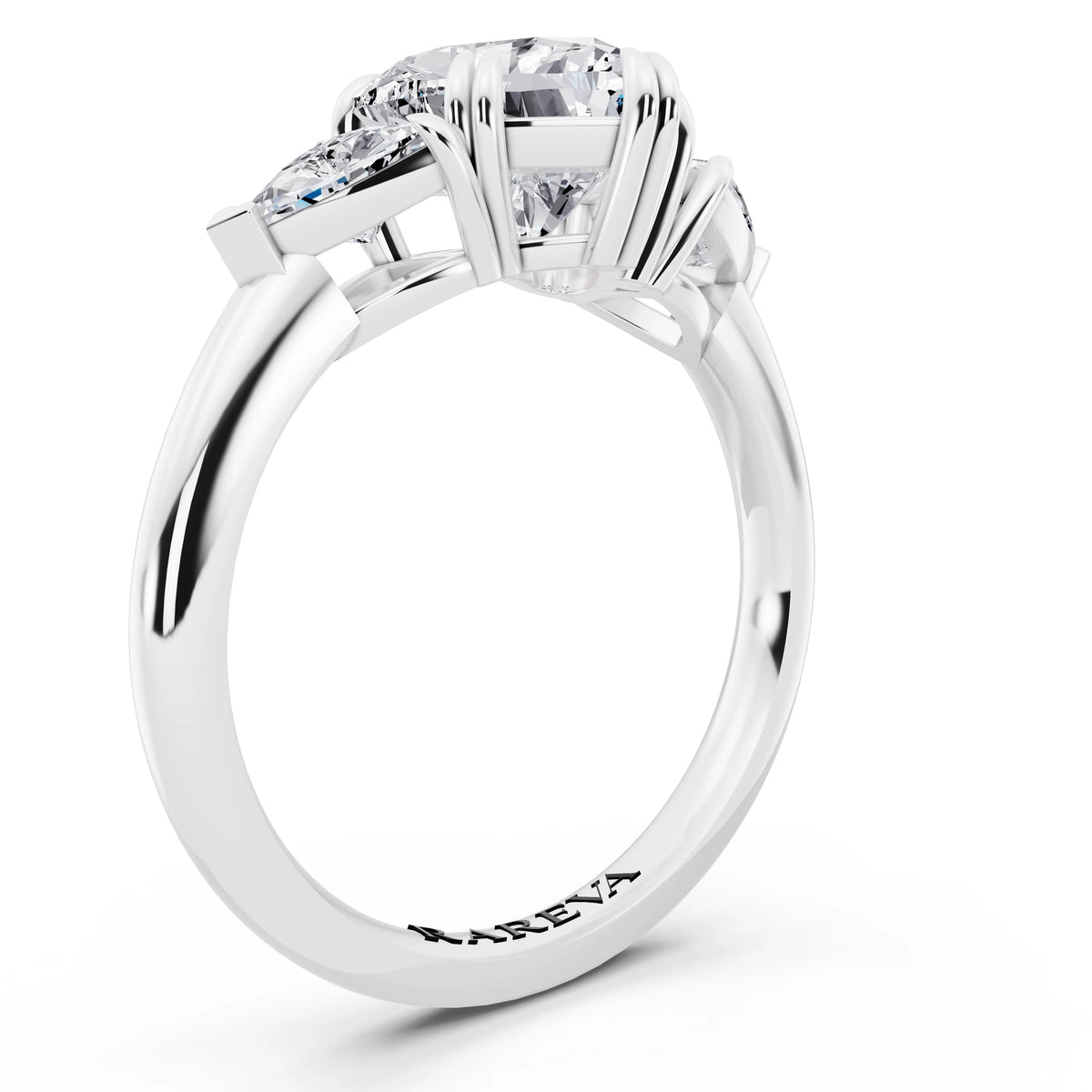 Platinum Heart Cut Diamond Three Stone Ring with Trillion Accents - top view