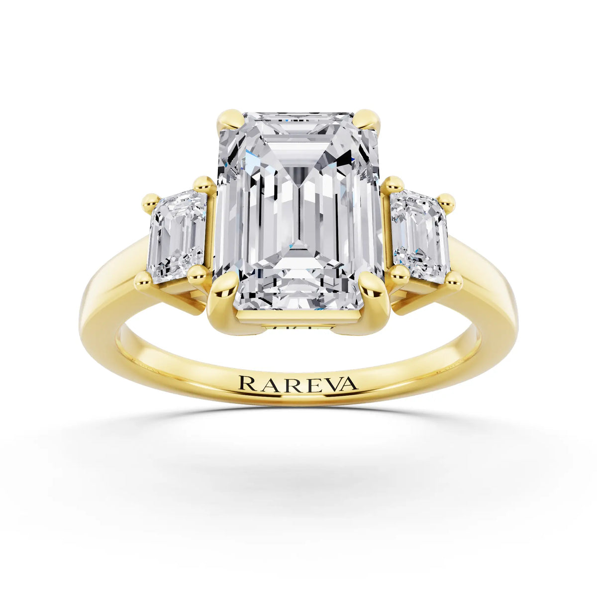 14 KT Yellow Gold Emerald Cut Diamond Three Stone Emerald Accent Ring - front view