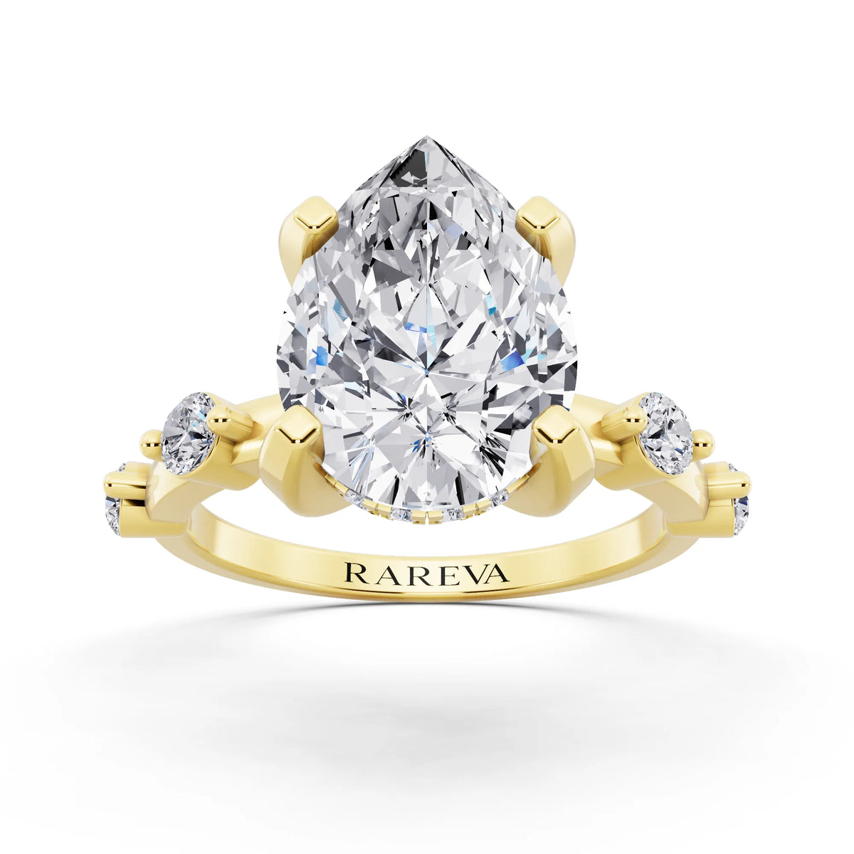 18 KT Yellow Gold Pear Cut Diamond Solitaire Ring with Floating Diamond Accents - front view