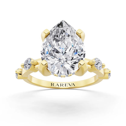 18 KT Yellow Gold Pear Cut Diamond Solitaire Ring with Floating Diamond Accents - front view