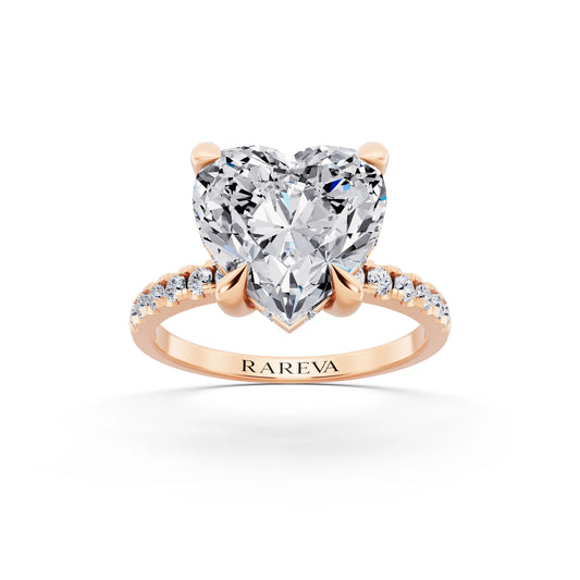 18 KT Rose Gold Heart Cut Diamond Solitaire Ring with Round Pavé Band and Prong Setting - front view
