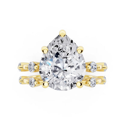 14 KT Yellow Gold Pear Cut Diamond Ring with Floating Accent Band - top angle