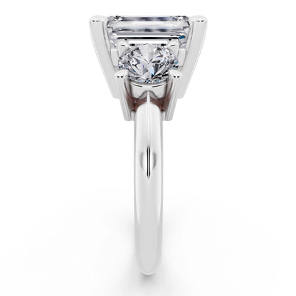 14 KT White Gold Emerald Cut Diamond Three Stone Ring with Round Accents - side view