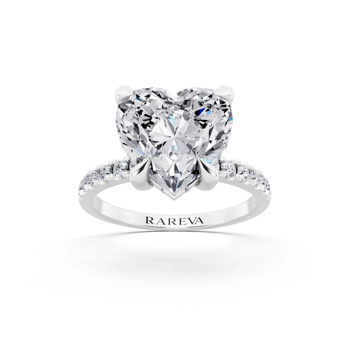 14 KT White Gold Heart Cut Diamond Solitaire Ring with Round Pavé Band and Prong Setting - front view