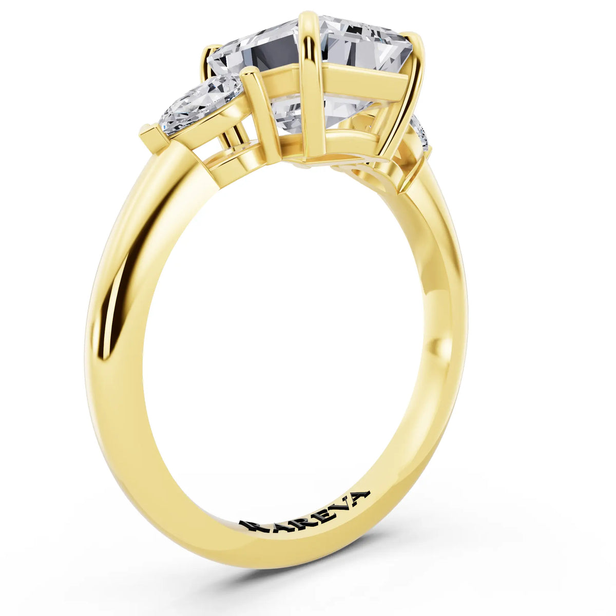 18 KT Yellow Gold Emerald Cut Diamond Three Stone Pear Accent Ring - top view